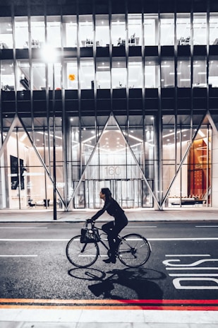 woman riding bicycle photograph