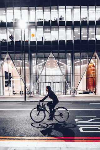 woman riding bicycle photograph