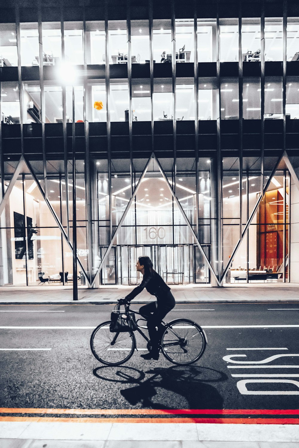 woman riding bicycle photograph