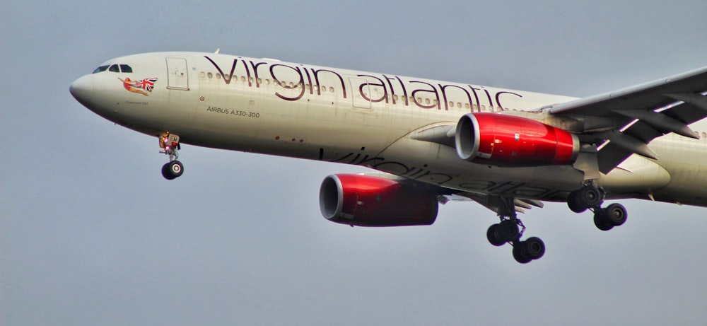 flying Virgin Atlantic plane during daytime