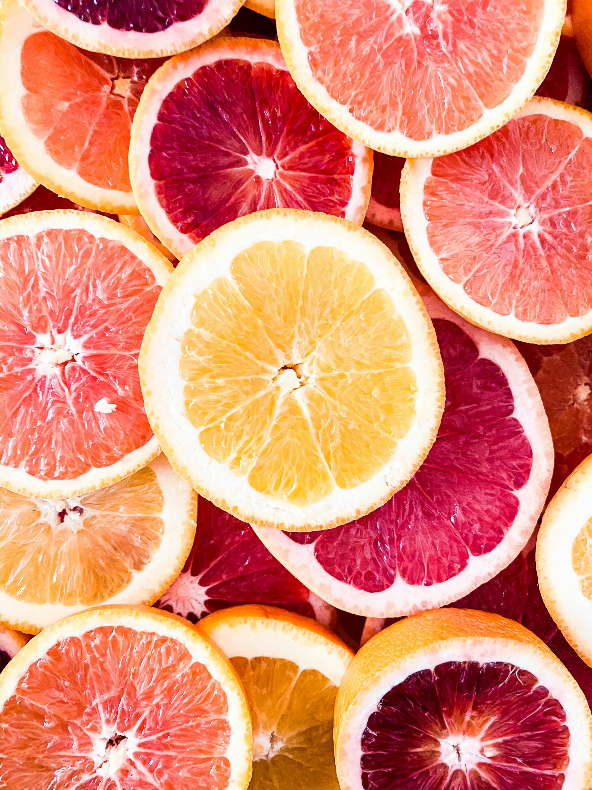 various citrus fruits - citron, orange, grapefruit