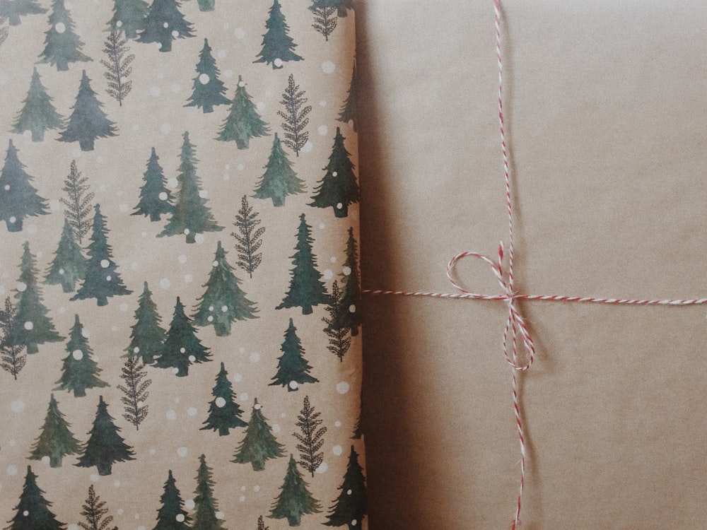 a wrapping paper wrapped in brown paper with trees on it