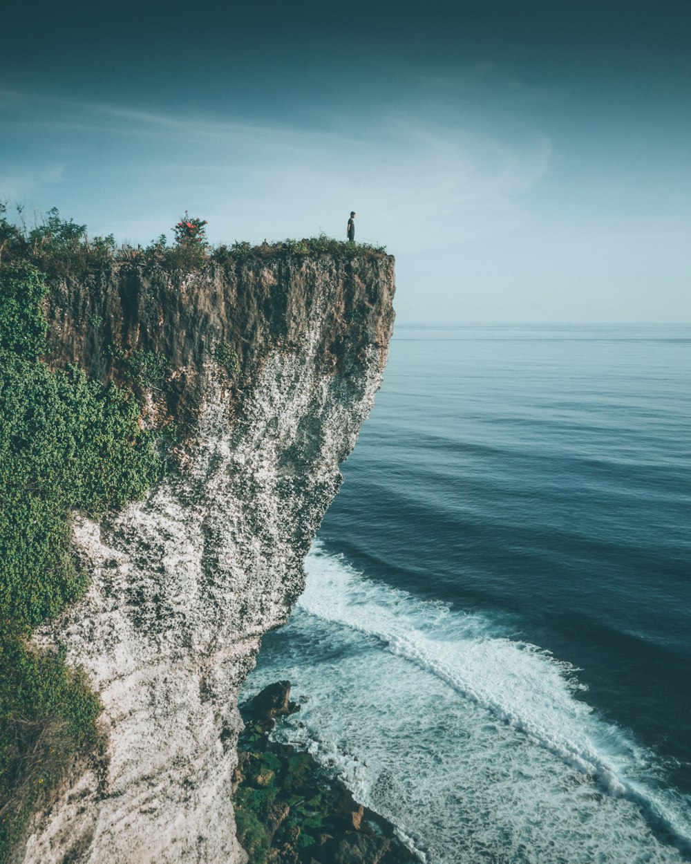 person standing on cliff