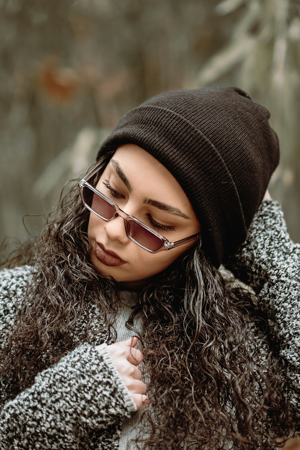 woman holding her head