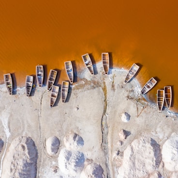 boats dock on sand