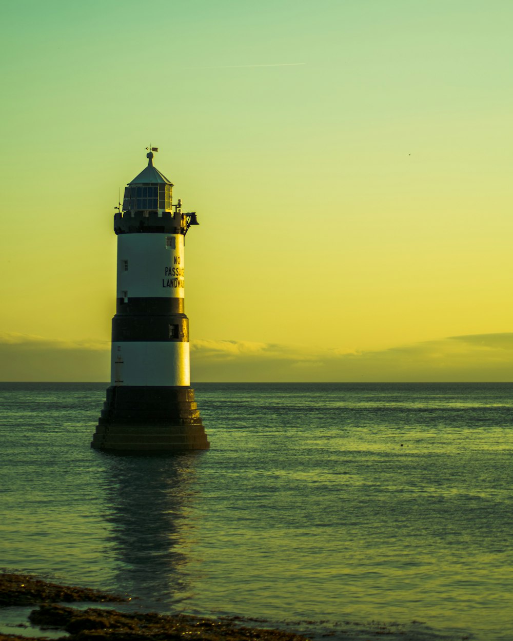 white and black lighthouse