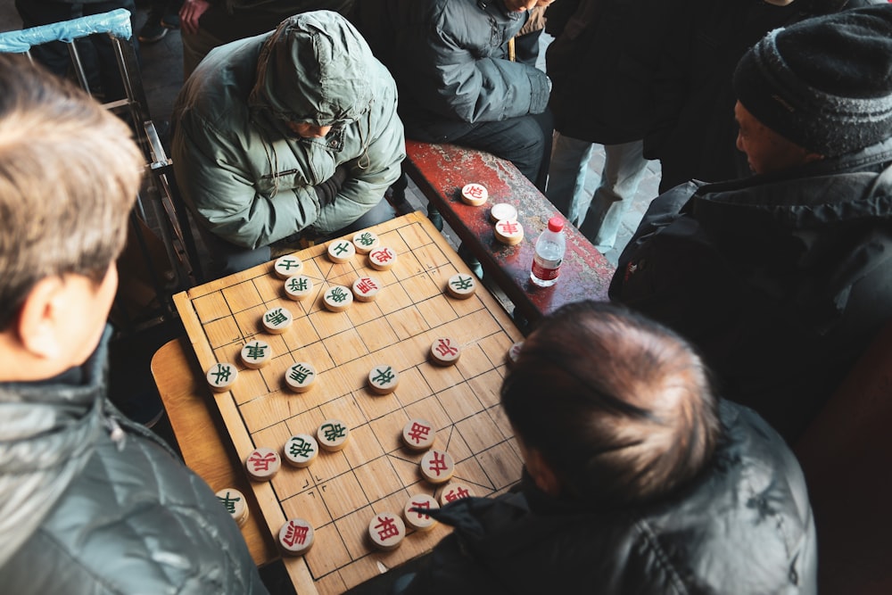 man playing board game photograph