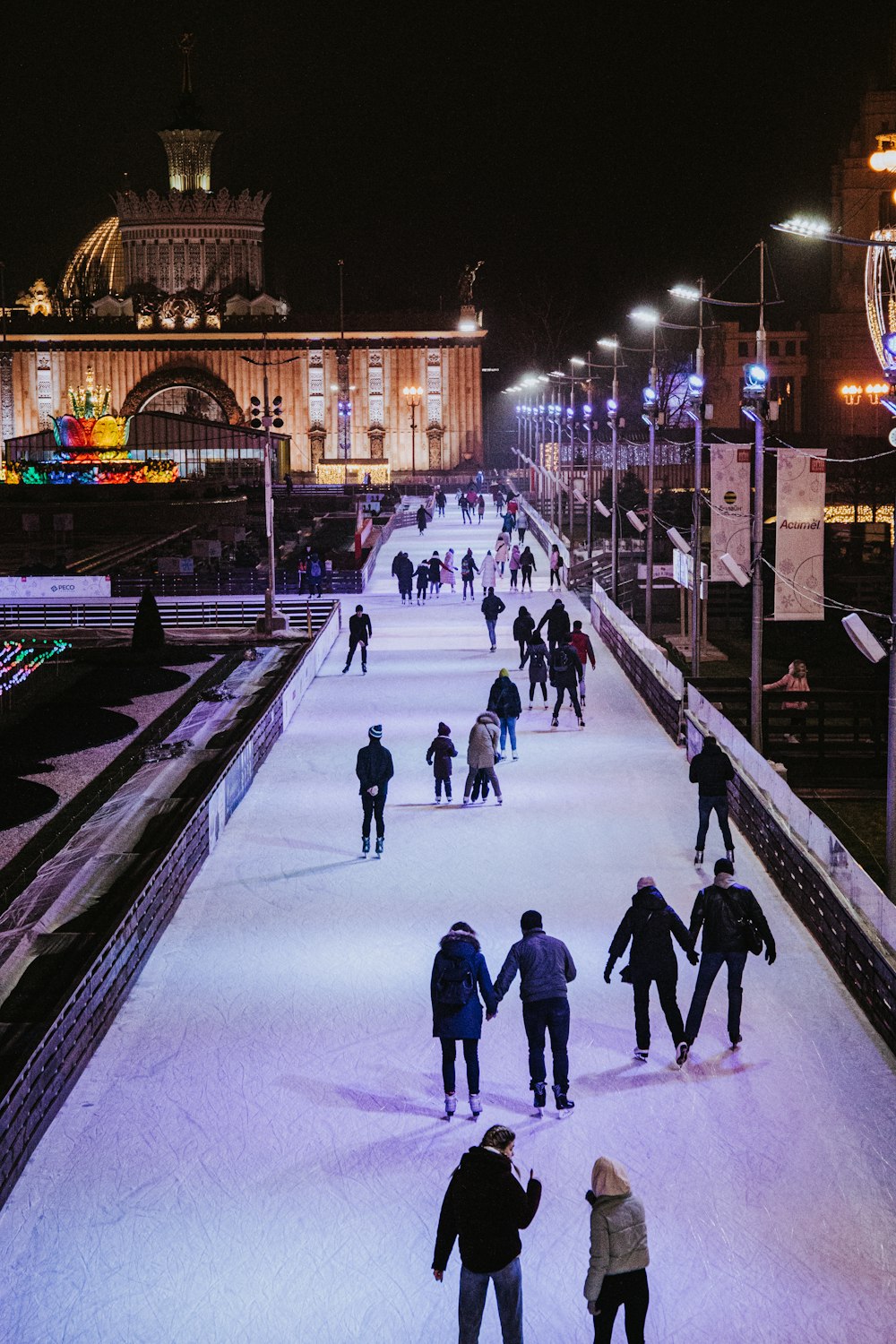 people skating on snow