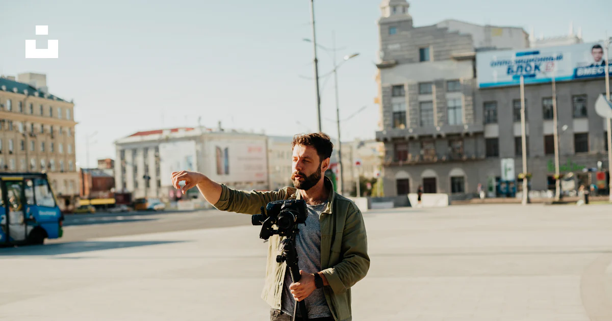 Pointing Near Man pointing near buildings photo – Free Human Image on Unsplash