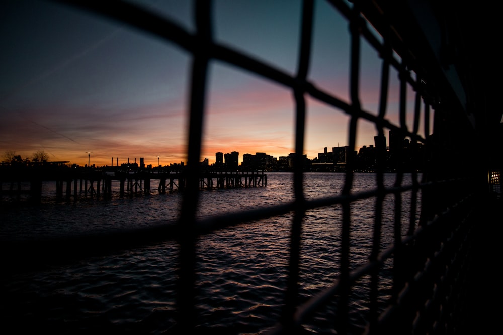 city and body of water during golden hour