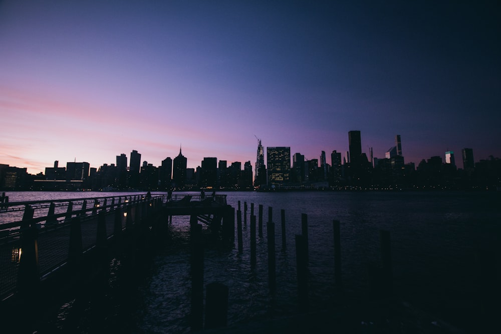 city and body of water during golden hour