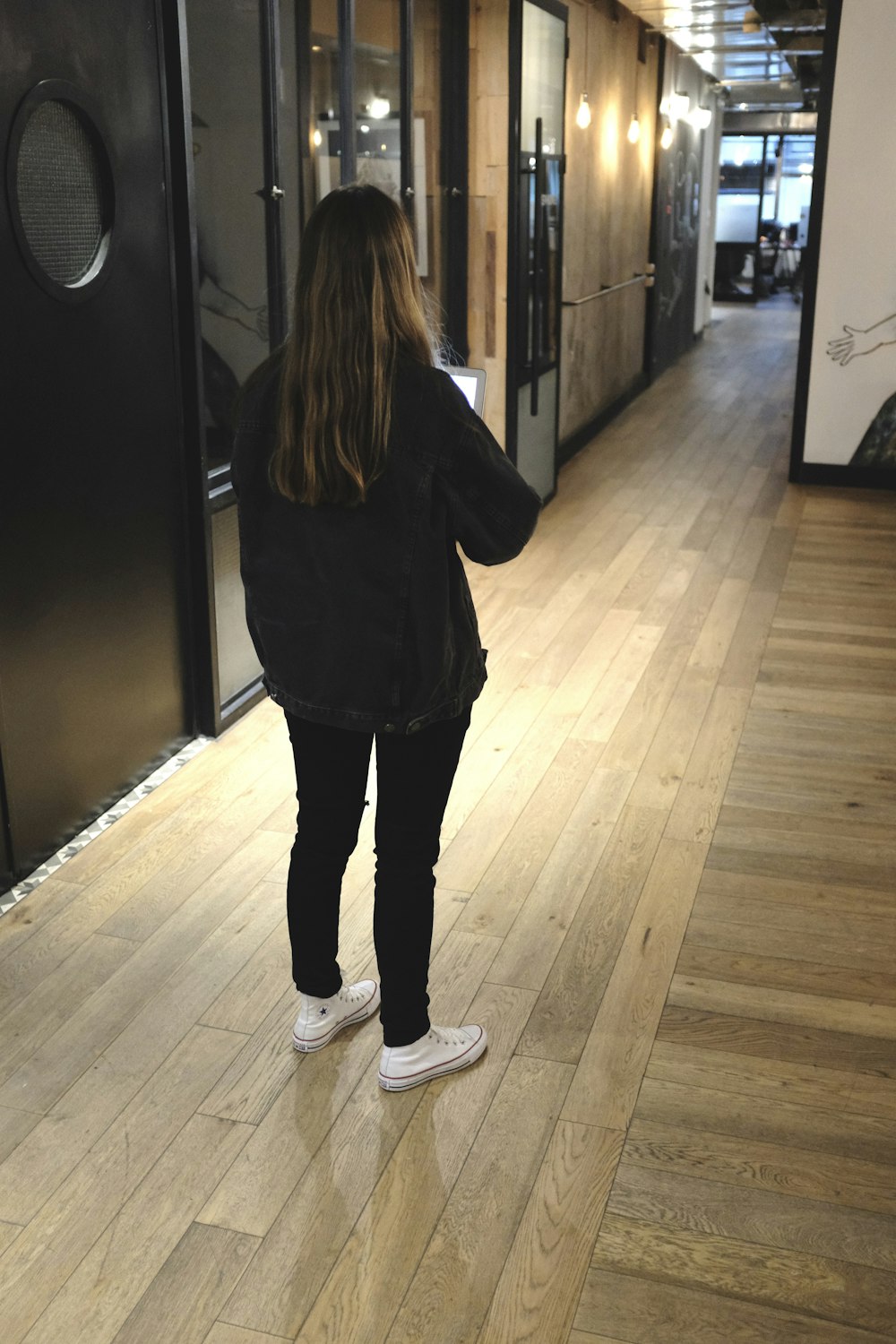 woman in black sweater and pants