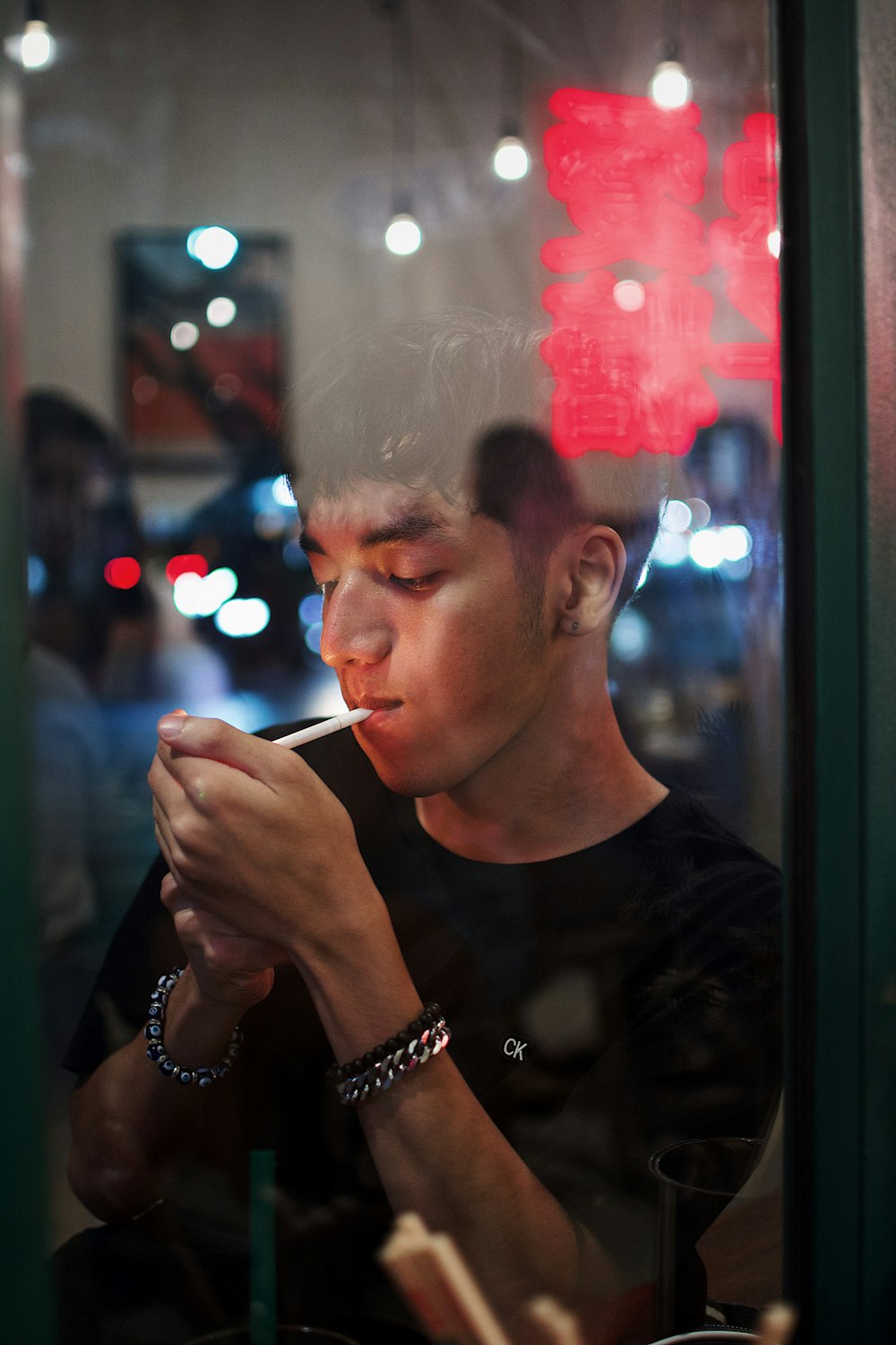 man smoking cigarette