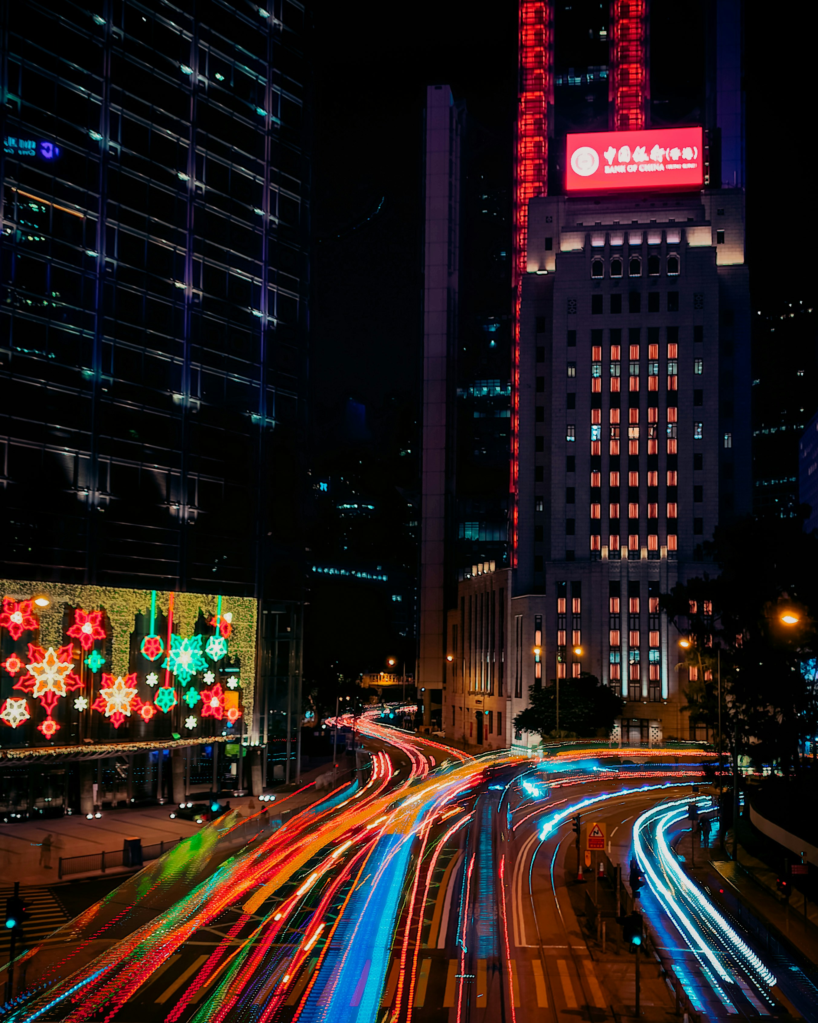 A city street filled with lots of traffic at night photo – Free Hong ...