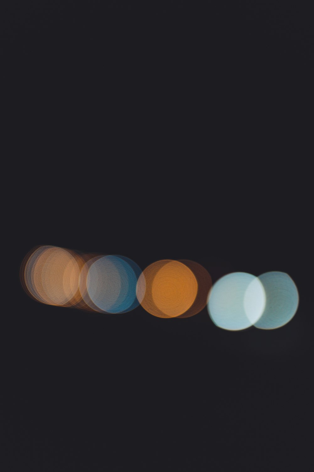 a group of blurry lights in the dark