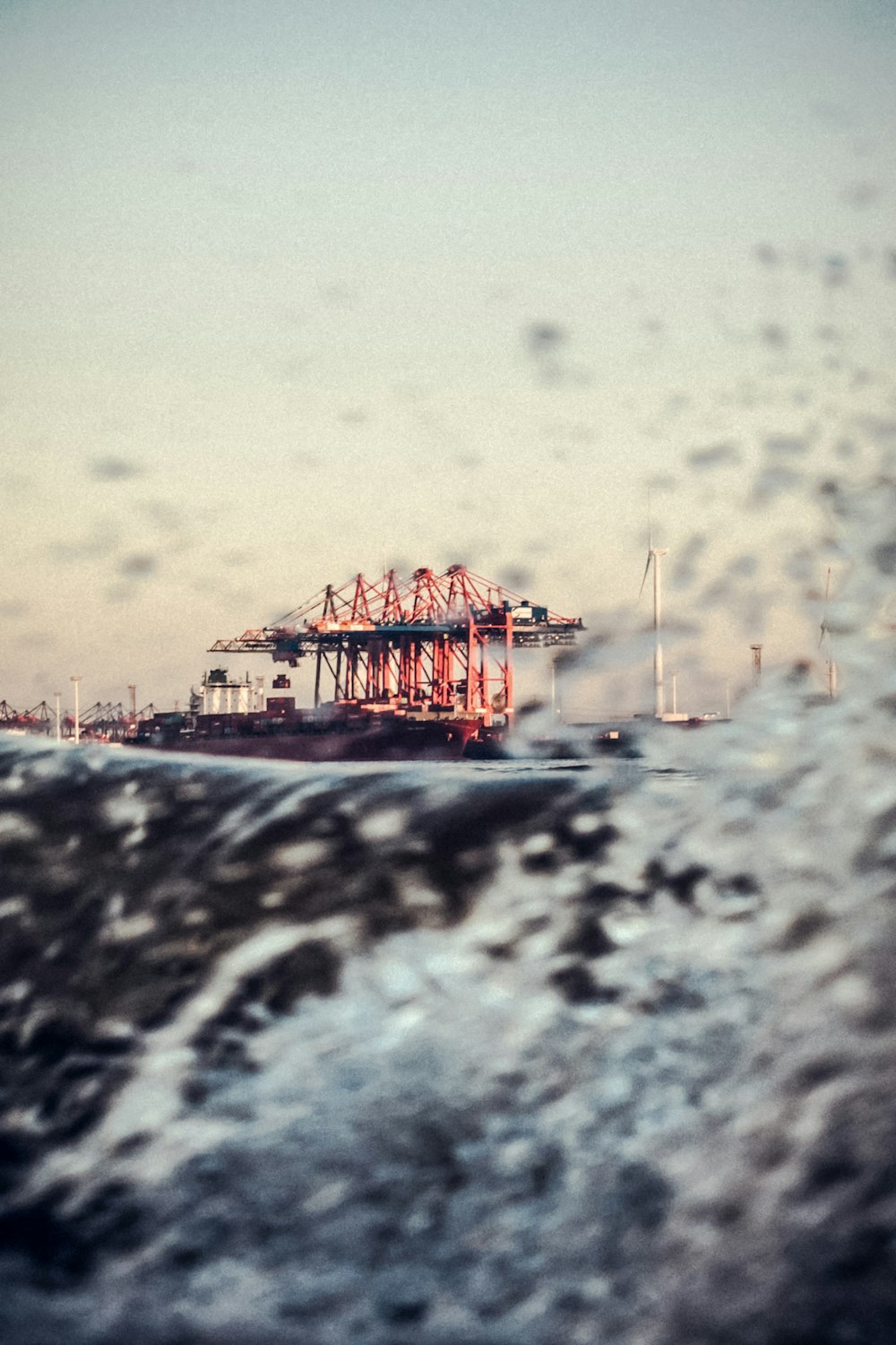 a large cargo ship in the middle of a body of water