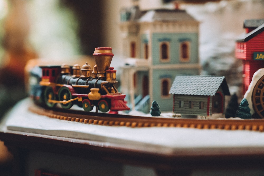 selective focus photography of village miniature