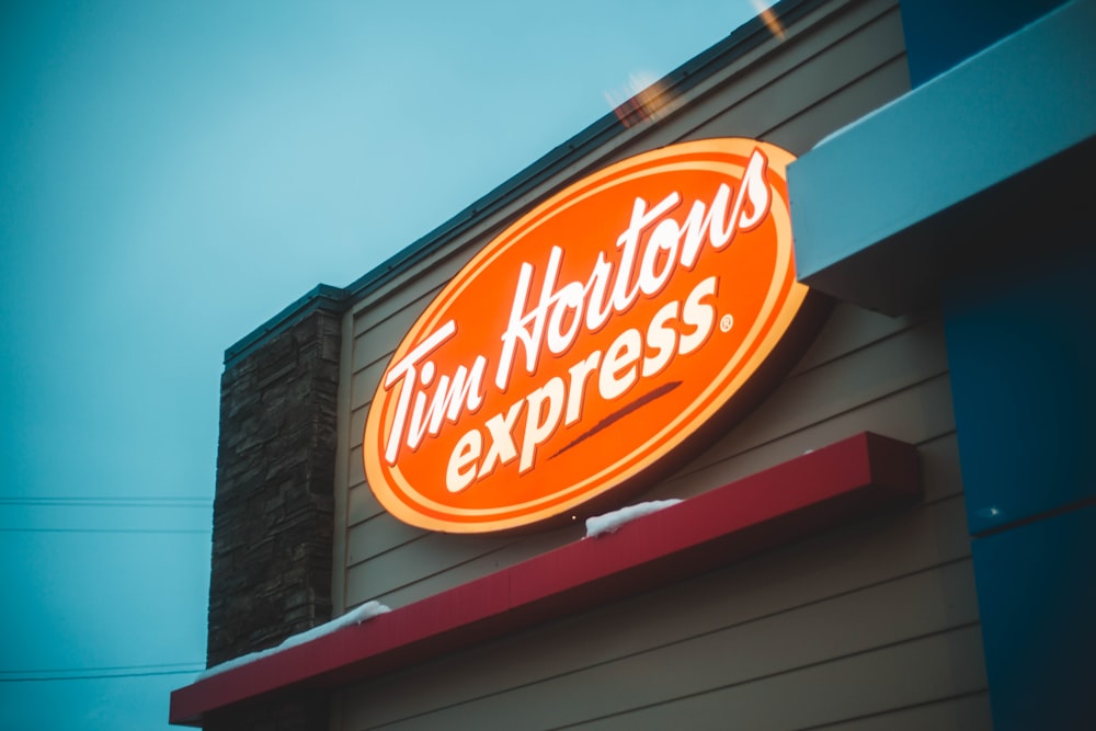 shallow focus photo of Tim Hortons Express signage