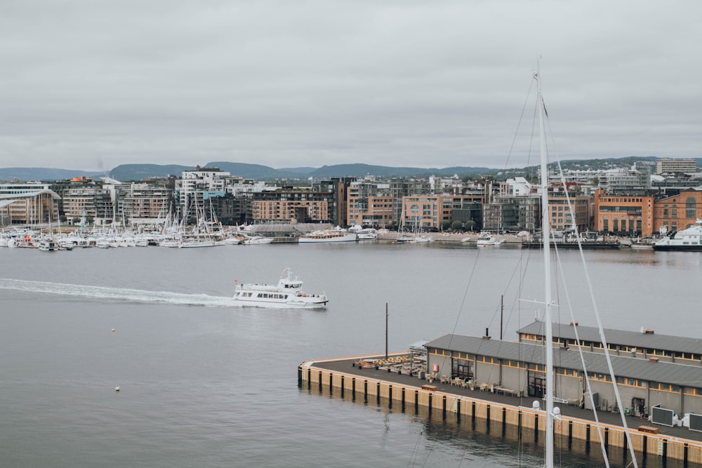 white boat on body of water