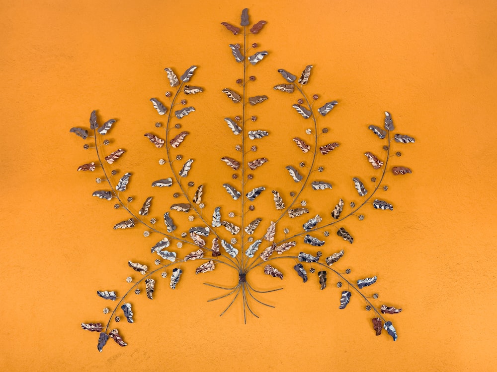 silver-colored floral emblem