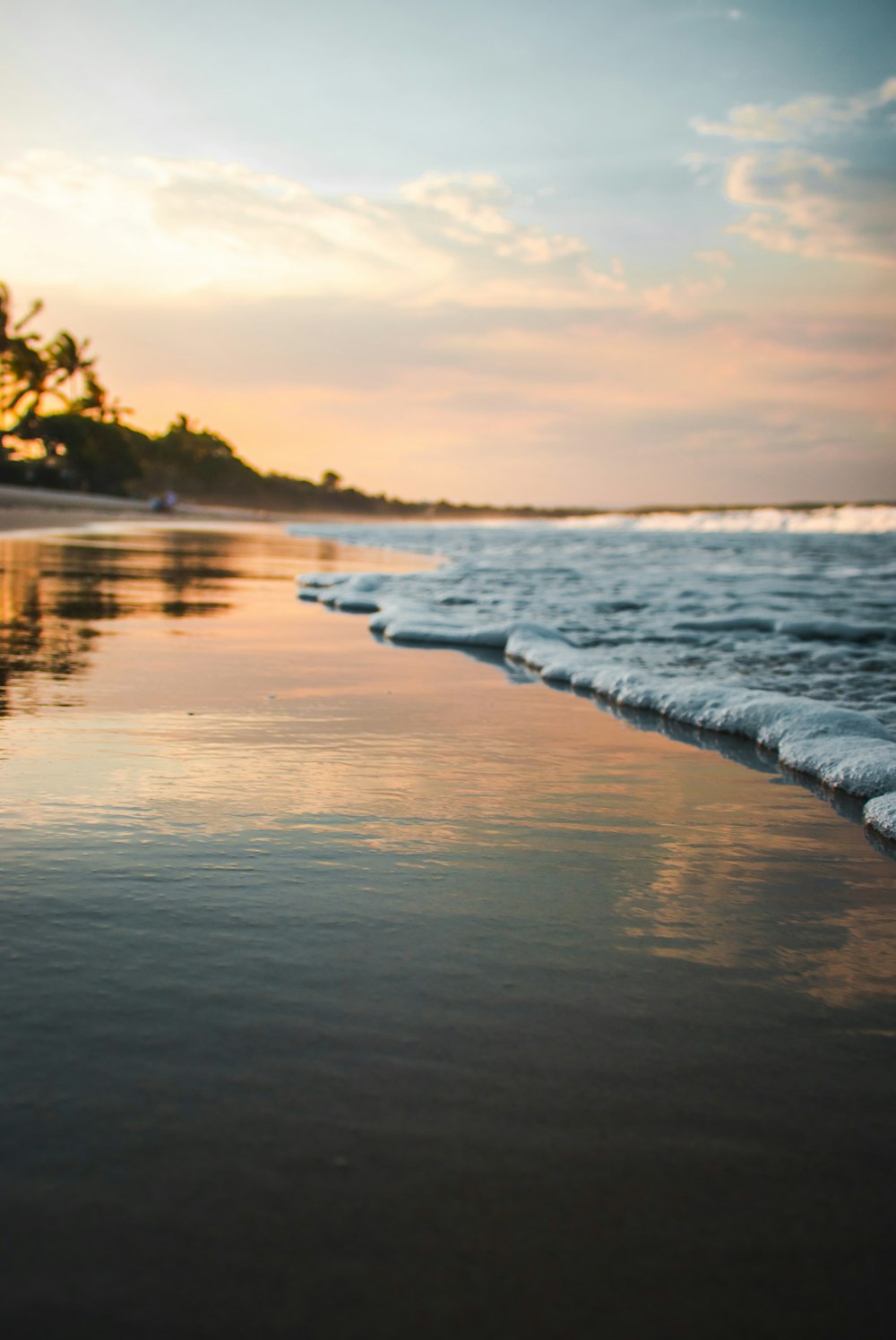 body of water and sand