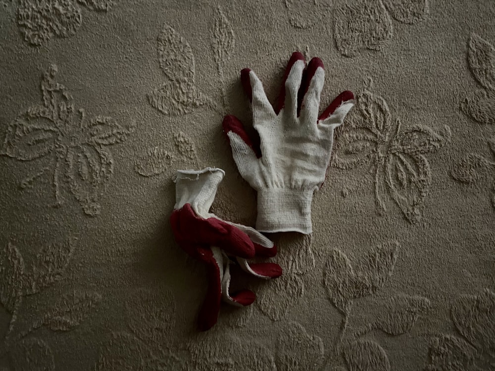 white-and-red utility gloves