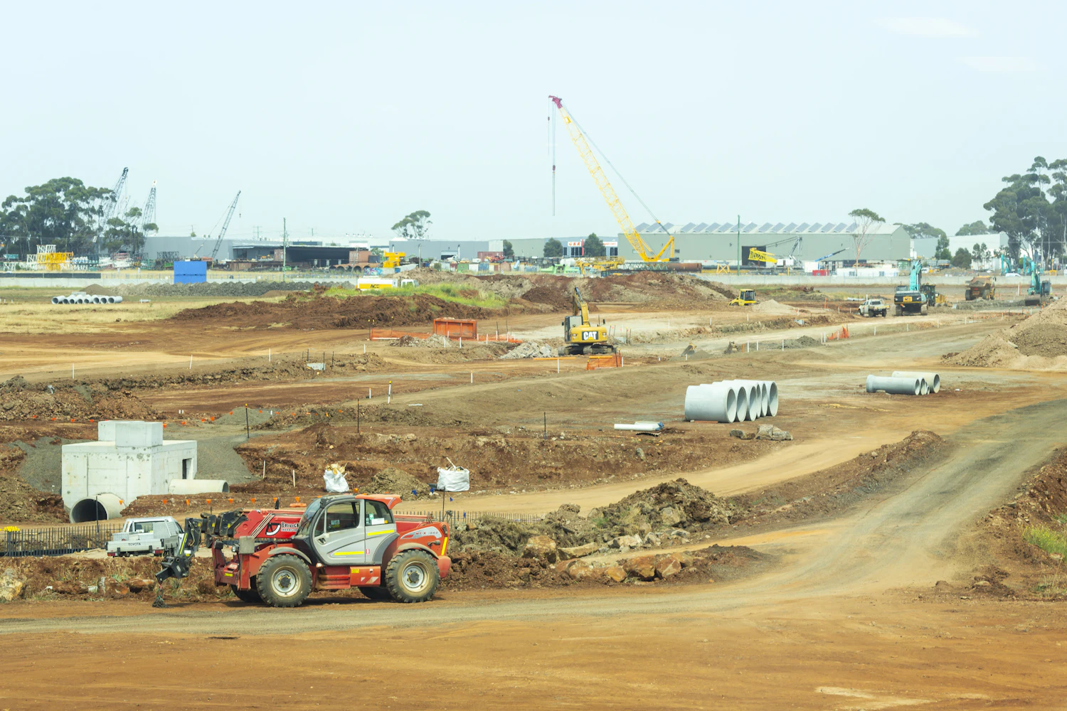 Excavator and heavy equipment on site