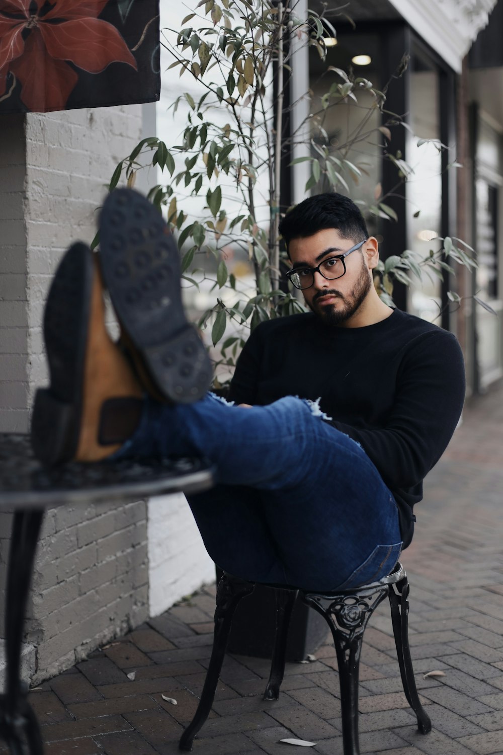 man sitting on chair