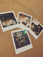 Five polaroid photographs are laid out on a tan surface. Each photo features groups of people at various social gatherings, seemingly enjoying themselves at restaurants or bars. The photos contain friends or family smiling, posing together, and sharing meals and drinks.
