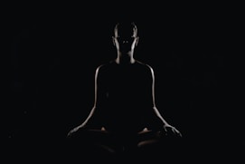 person doing meditation pose
