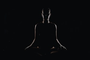 person doing meditation pose