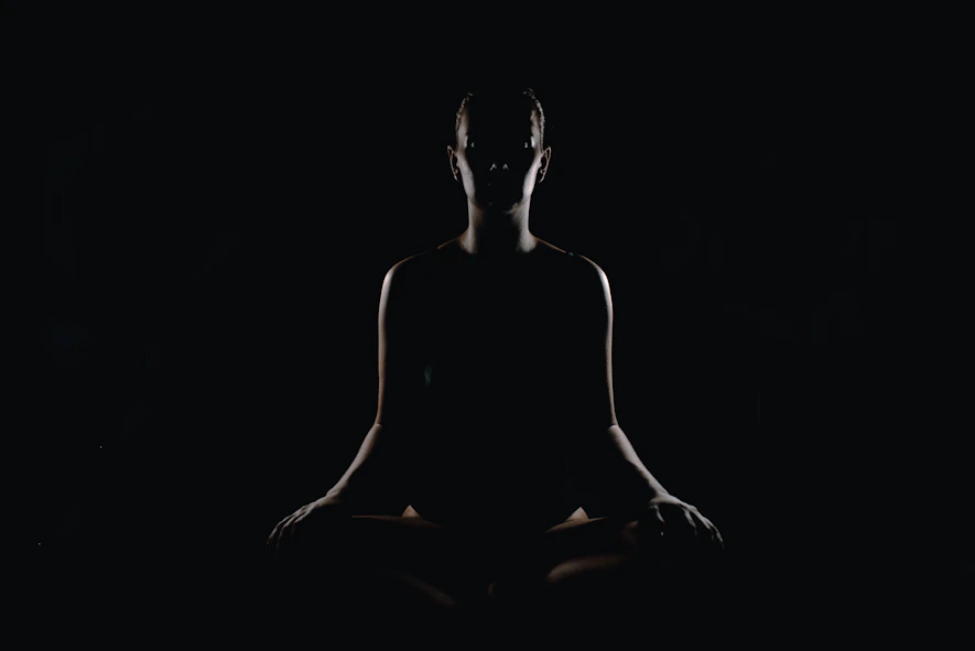 person doing meditation pose