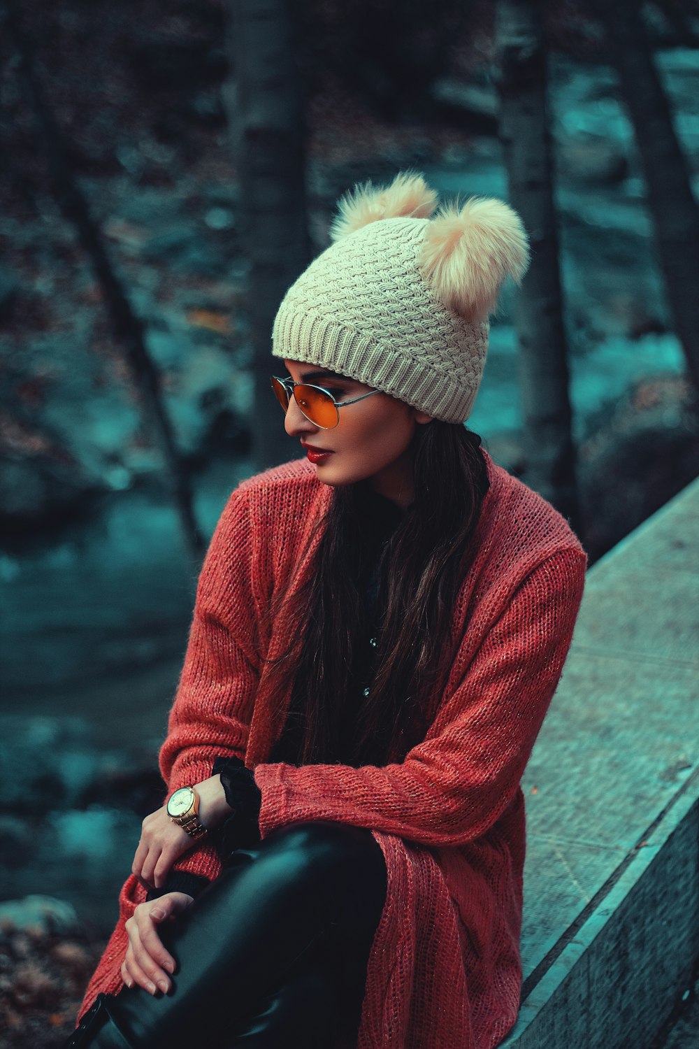 woman wearing red cardigan