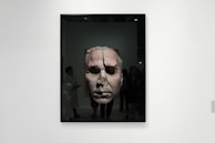 A finished art piece framed and hung on a gallery wall, inviting viewers to connect.