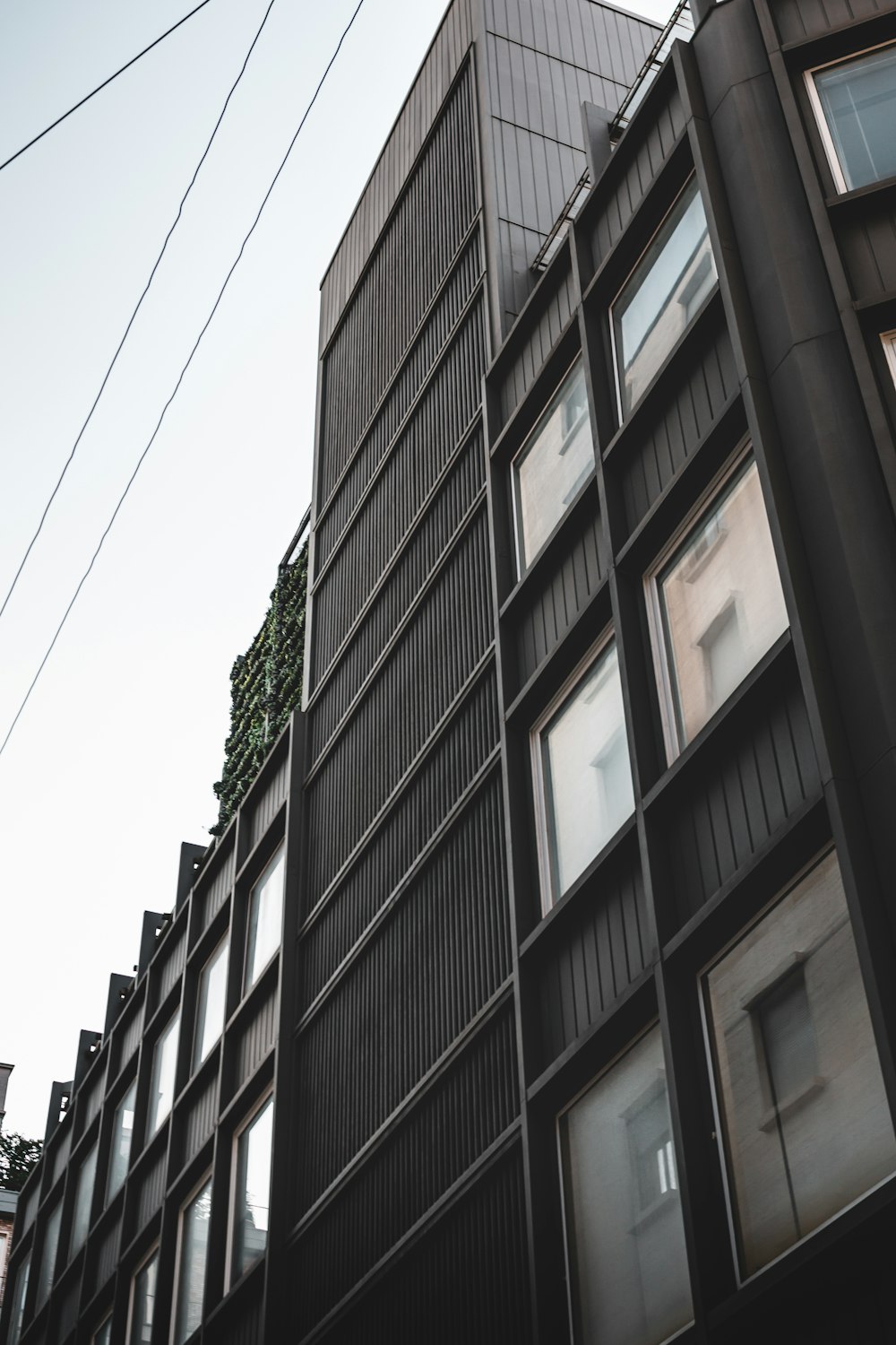 low-angle photography of gray building during daytime