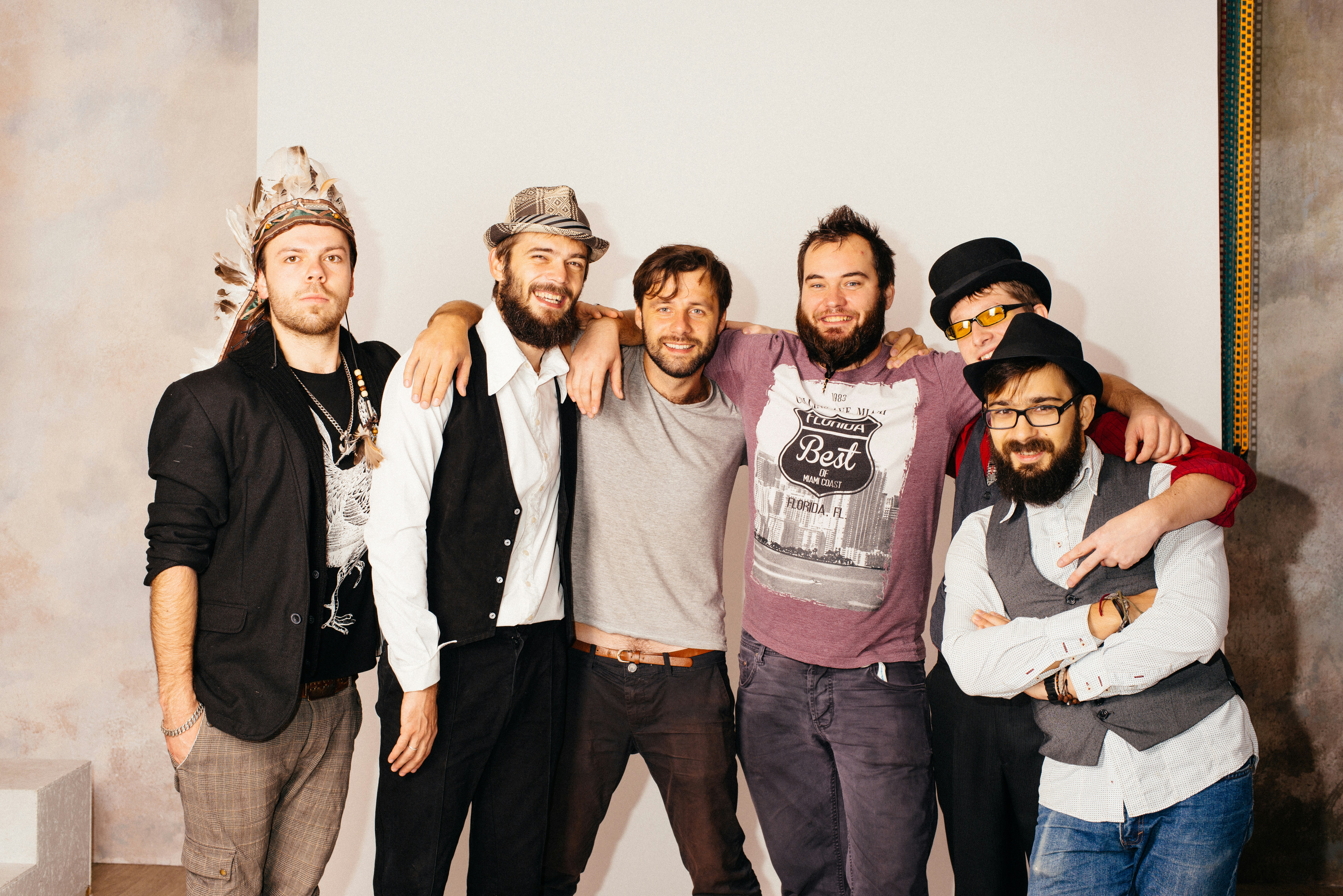 Portrait of positive men on the white background
