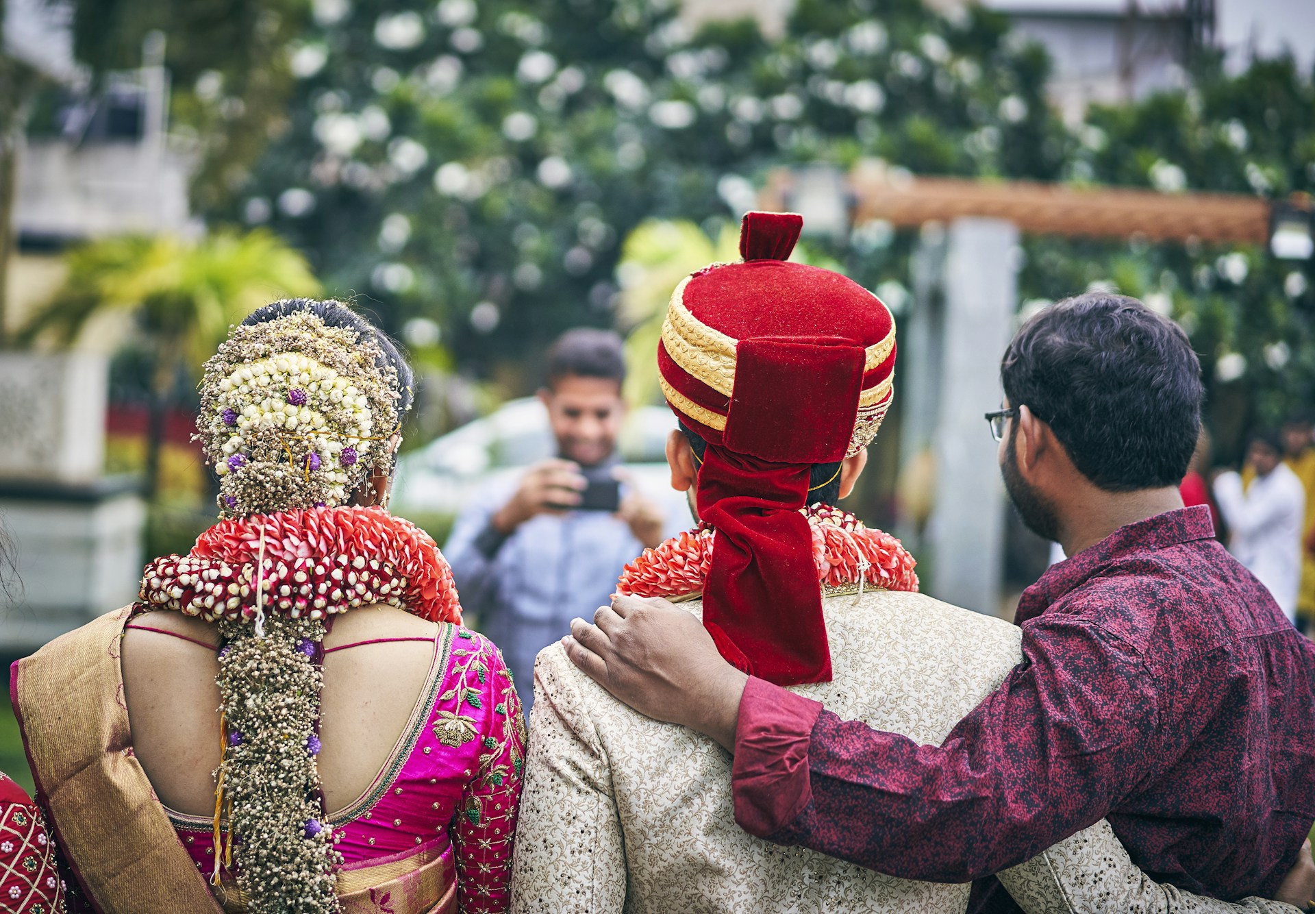 men and woman posing for photo