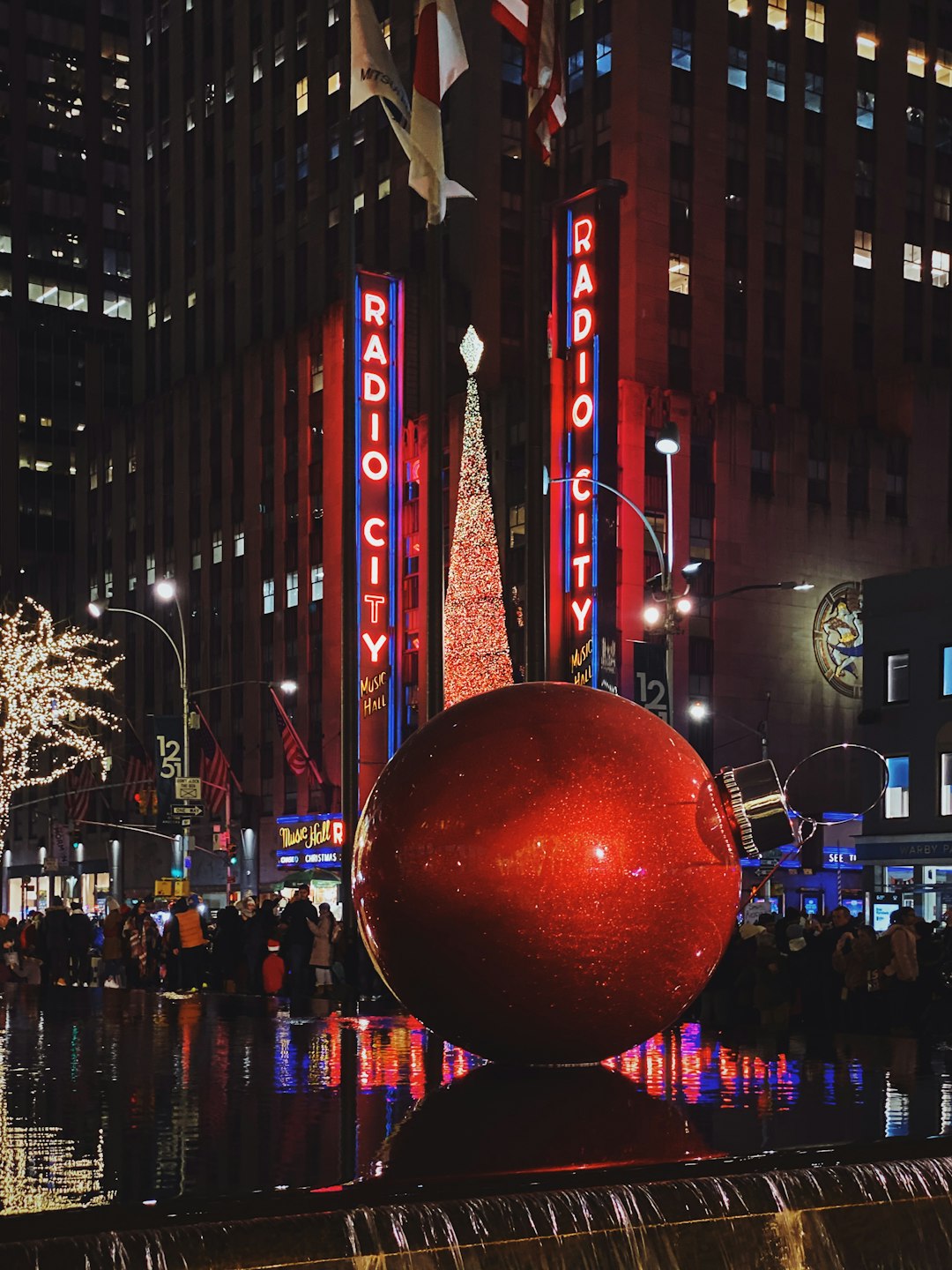 red bauble statue in city