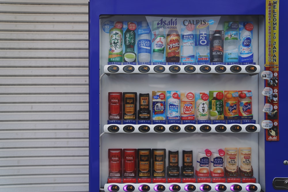 assorted-brand beverages inside beverage cooler