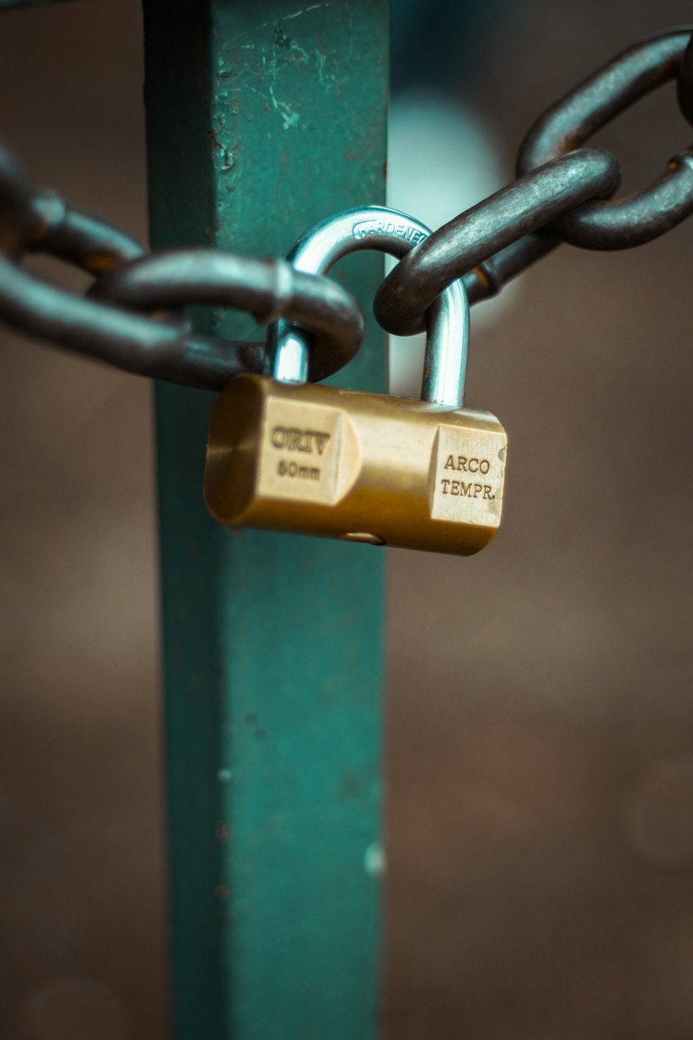 brass-colored padlock