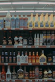 a display in a store filled with lots of bottles