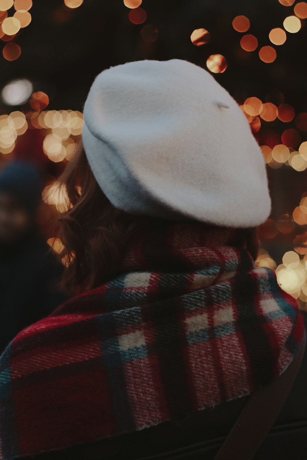 woman wearing white hat