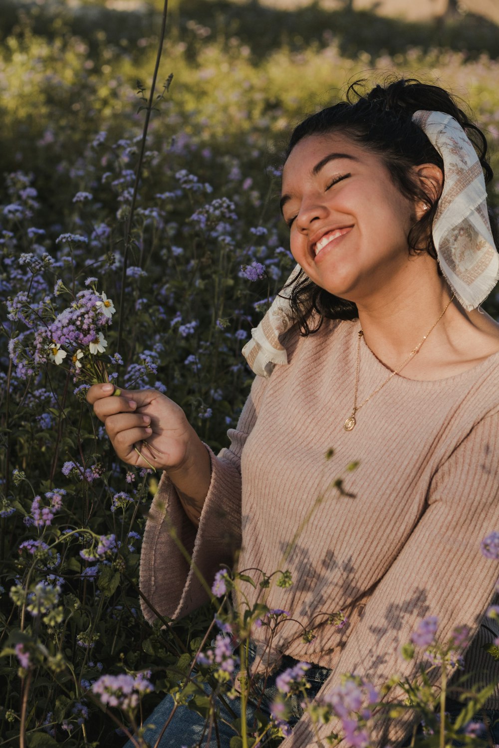 woman holding flower