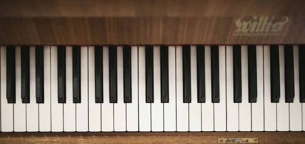 brown, white, and black piano keys