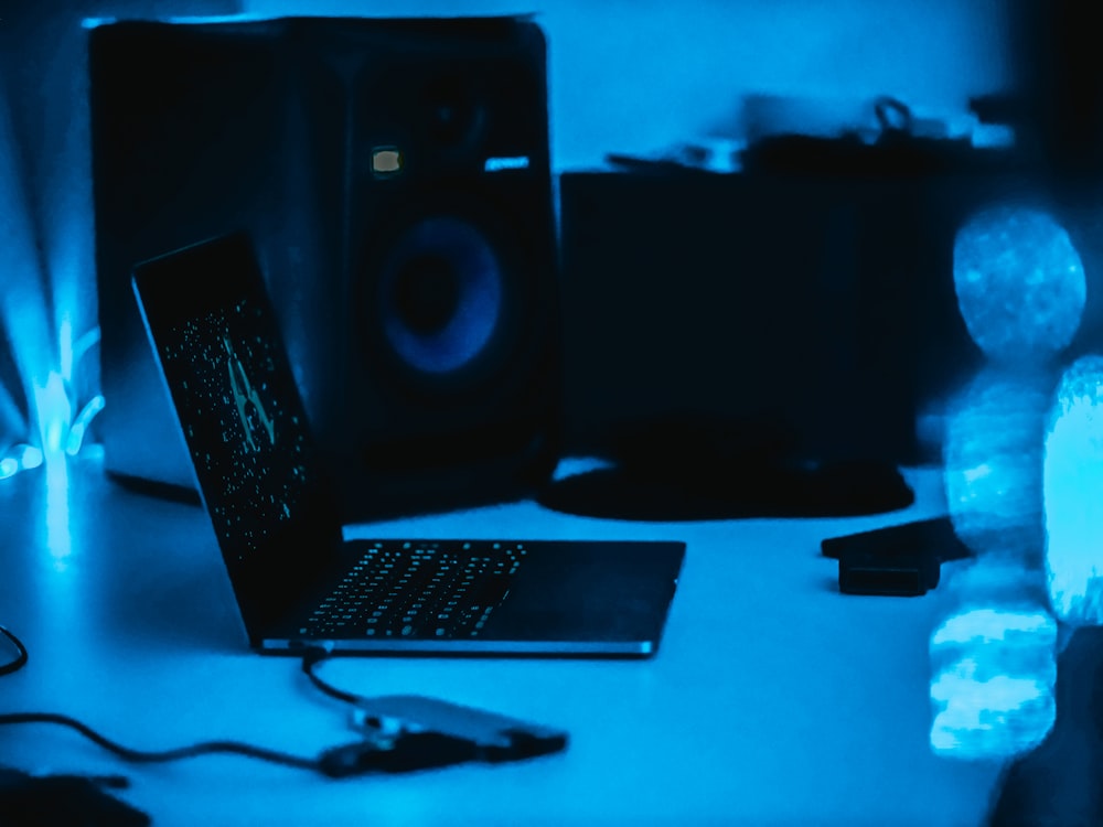 black laptop computer on desk