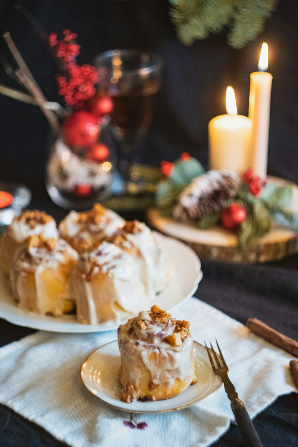 cinnamon roll on a ceramic saucer