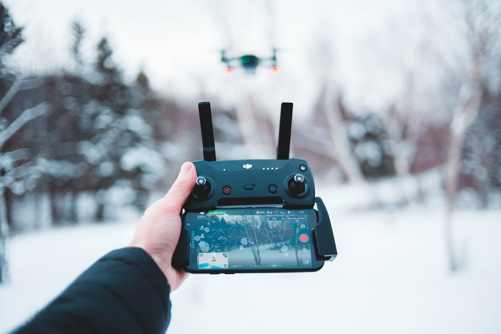 shallow focus photo of black radio controller