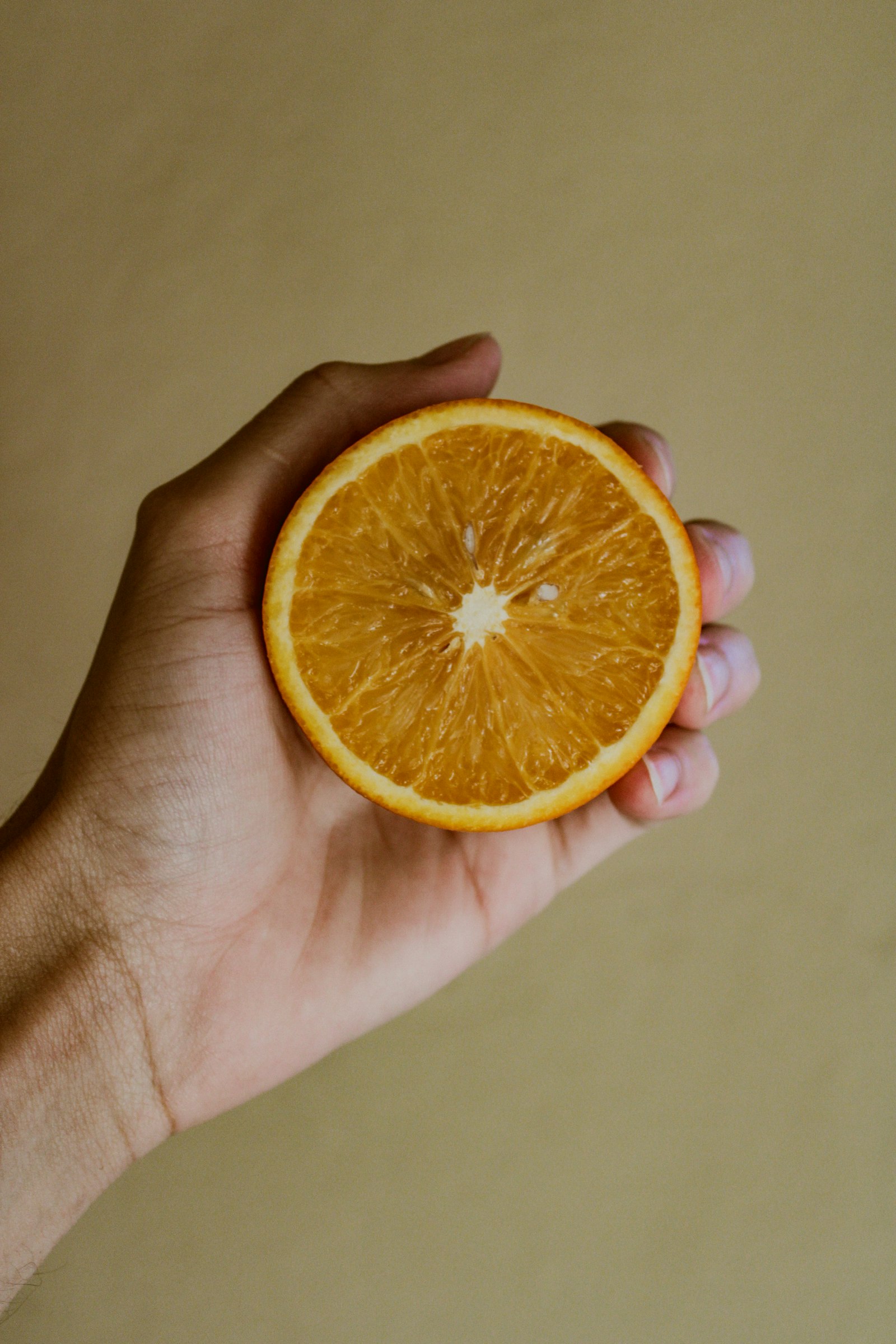 Canon EOS 2000D (EOS Rebel T7 / EOS Kiss X90 / EOS 1500D) sample photo. Slice of orange fruit photography