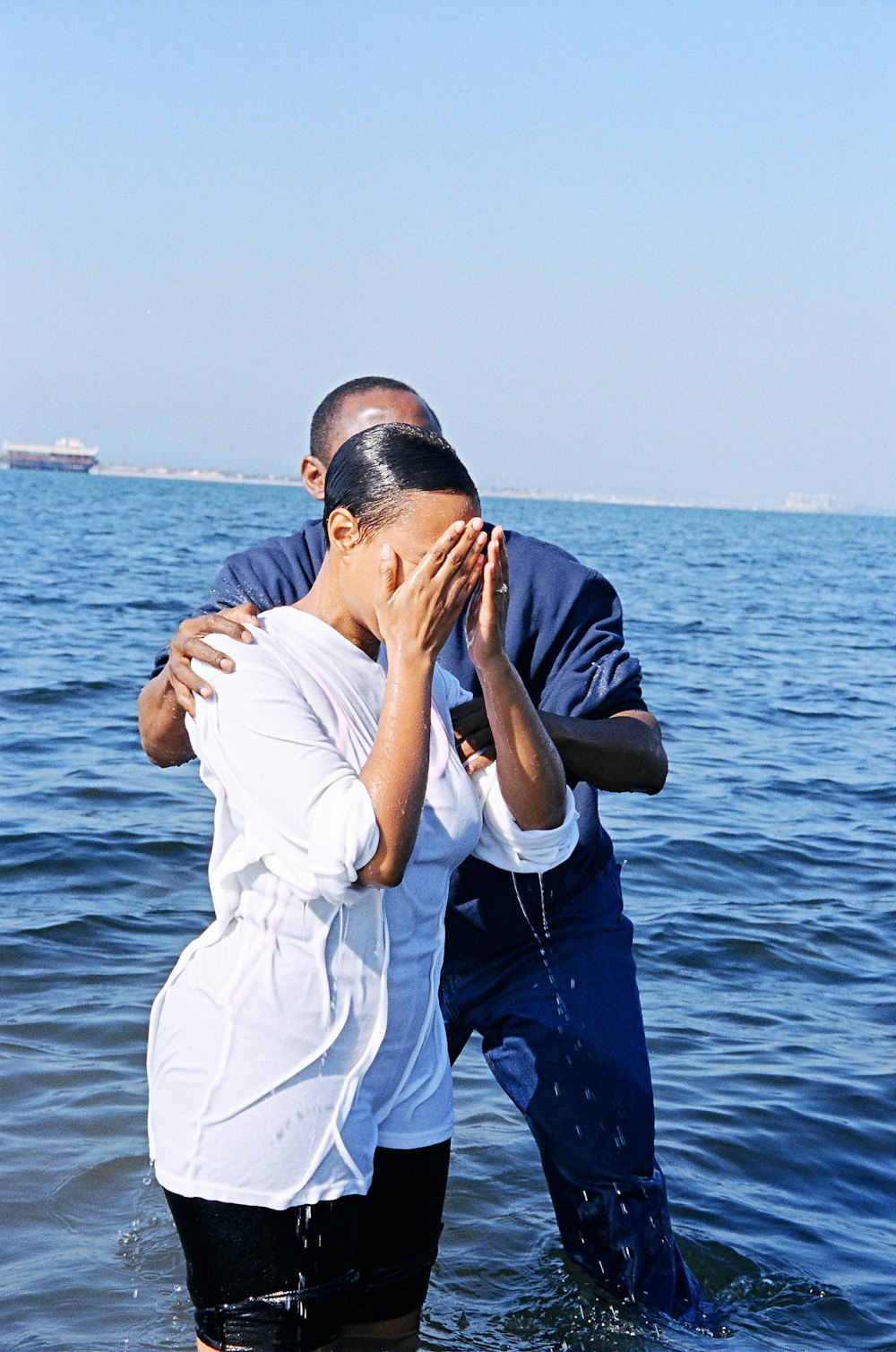 man and woman enjoying on beach