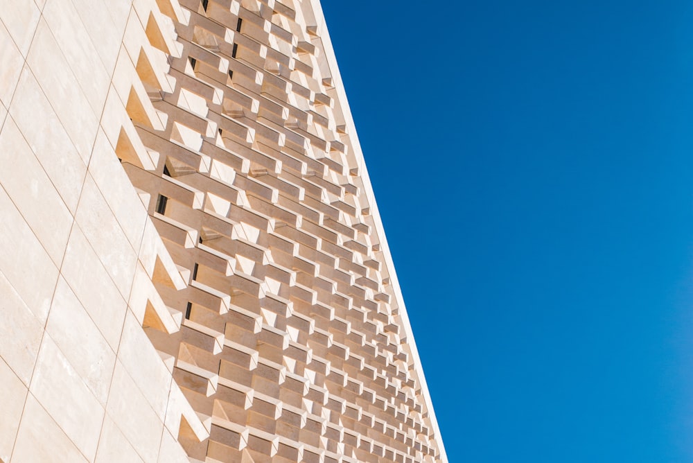 low-angle photograph of concrete structure